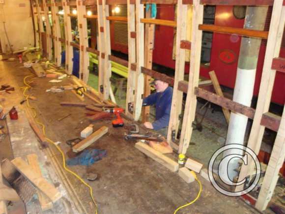 1730-interior-Mike-works-on-screwing-strip.
