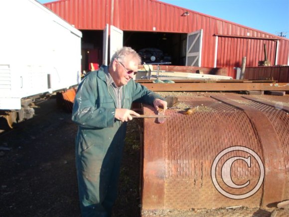 Owen-uses-the-well-wagon-as-a-work-space
