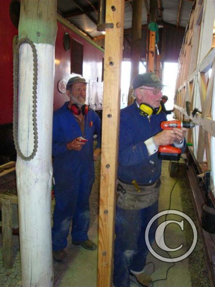 Warren-and-Mike-work-on-the-west-wall